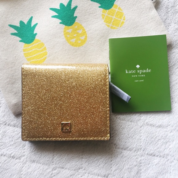 kate spade Handbags - Kate Spade gold mini glitter wallet NWT